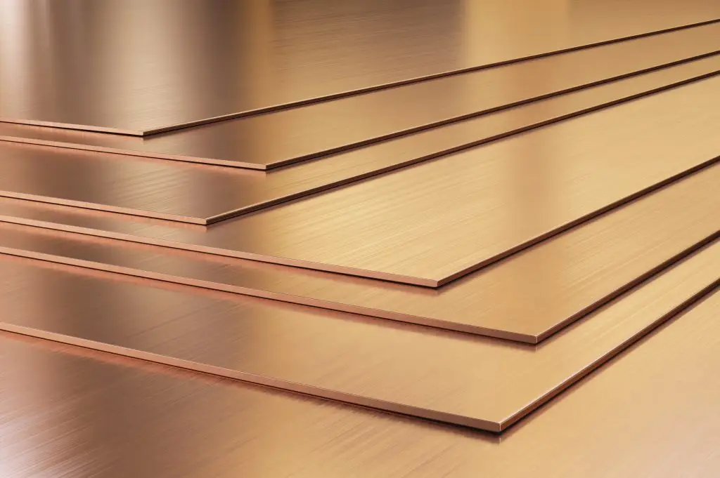 Copper sheets. Rolled metal products close-up